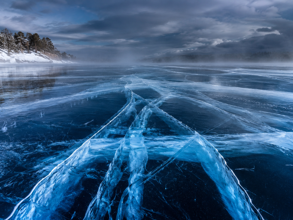 Dramatic cracking ice on frozen lake in Minnesota